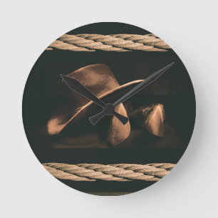 Horloge Ronde Casquette de cowboy, bottes et style occidental de