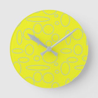 Horloge Ronde Cercles et boucles jaunes