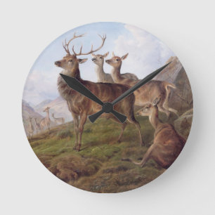 Horloge Ronde Cerfs communs rouges dans un paysage des
