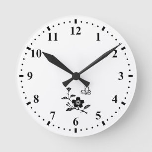 Horloge Ronde Cerisier branchu avec papillon sautant sur cerisie