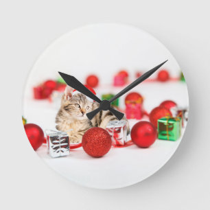 Horloge Ronde Chat portant le chapeau rouge du Père Noël