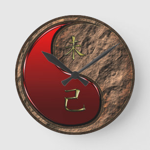 Horloge Ronde Chèvre de Terre