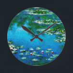 Horloge Ronde Claude Monet-Water-Lilies<br><div class="desc">Water-Lilies made in 1906,  is one of Claude Monet’s most famous paintings.An elegant round wall clock intensities of blue, green and yellow for Impressionism lovers and everyone who appreciates real fine art.</div>