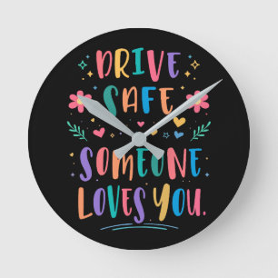 Horloge Ronde Conduisez en toute sécurité, quelqu'un vous aime