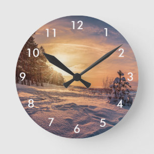 Horloge Ronde Coucher de soleil sur la côte de la mer d'hiver