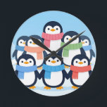 Horloge Ronde Cute Penguins Winter Scarves Group Hug<br><div class="desc">Adorable gang of cheerful cartoon penguins wrapped in colorful cozy scarves,  huddling together on a snowy blue background. Sweet,  heartwarming and playful,  this charming winter scene radiates joy and friendship.</div>