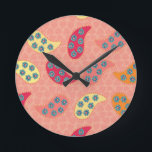 Horloge Ronde Dancing Boho Paisley<br><div class="desc">This 'Boho' range has matching accessories to throw cushions from, this one is deep peach with a delicate leaf panel to soft batik green, coral floral details. Add quality and richness to any interior or space - inspired by a touch of vintage paisley pattern in the patterns. There is a...</div>