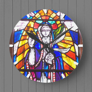 Horloge Ronde Design en verre tendu avec la figure religieuse.