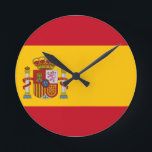 Horloge Ronde drapeau d'espagne<br><div class="desc">Le drapeau de l'Espagne (espagnol : Bandera de España), tel qu'il est défini dans la Constitution espagnole de 1978, se compose de trois bandes horizontales : rouge, jaune et rouge, la bande jaune étant deux fois plus grande que chaque bande rouge. Traditionnellement, la bande médiane était définie par le terme...</div>