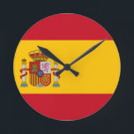 Horloge Ronde drapeau d'espagne<br><div class="desc">Le drapeau de l'Espagne (espagnol : Bandera de España), tel qu'il est défini dans la Constitution espagnole de 1978, se compose de trois bandes horizontales : rouge, jaune et rouge, la bande jaune étant deux fois plus grande que chaque bande rouge. Traditionnellement, la bande médiane était définie par le terme...</div>