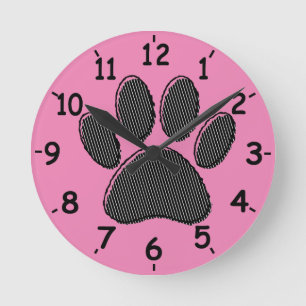 Horloge Ronde Empreinte de patte de chiot noir et blanc rayé sur