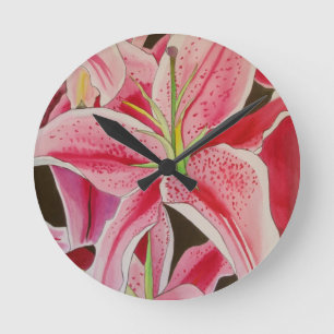 Horloge Ronde Fleur d'aquarelle Stargazer rose lièvre