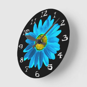 Horloge Ronde Fleur marguerite avec pétales bleus