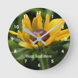 Horloge Ronde Fleur Susan aux yeux noirs