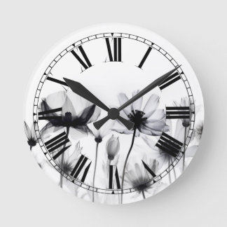 Horloge Ronde Fleurs à rayons X N&B élégantes