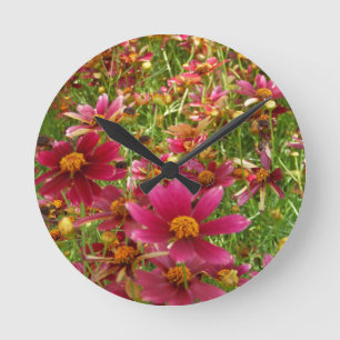 Horloge Ronde Fleurs de marguerite rose et jaune brillantes