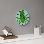 Horloge Ronde Green Octopus Design<br><div class="desc">This octopus design wall clock is a timekeeping device designed to hang on a wall, serving as both a functional tool and a decorative focal point for a room. Made from acrylic and features a pre-installed backside hanging slot for easy hanging and a non-ticking design. You can customise this wall...</div>