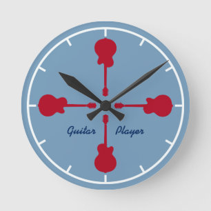 Horloge Ronde guitares rouges. guitariste