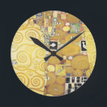 Horloge Ronde Gustav Klimt - The Hug - Art classique<br><div class="desc">Gustav Klimt - The Hug - Oeuvre classique de l'un des peintres les plus célèbres du monde.</div>
