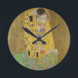 Horloge Ronde Gustav Klimt "The Kiss"<br><div class="desc">Gustav Klimt 's masterpiece: "The Kiss". “The Kiss, ” created by the Austrian painter Gustav Klimt. It’s considered to be his most famous work. He painted it between the years 1907 and 1908, which were the highpoint of his “Golden Period, ” when he painted a number of works utilizing gold...</div>
