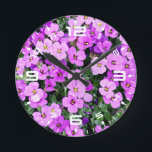 Horloge Ronde Jardin aux fleurs violettes<br><div class="desc">Jardin aux fleurs violettes</div>