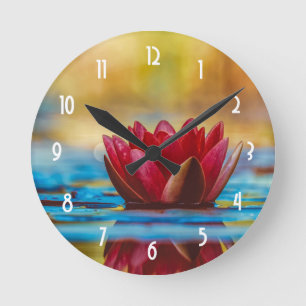Horloge Ronde Jolie photo d'une fleur de Lotus dans un étang
