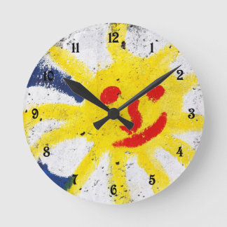 Horloge Ronde Joyeux visage du soleil souriant