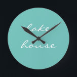 Horloge Ronde Lake House Turquoise Blue Aqua White Elegant Cool<br><div class="desc">Designed with beautiful light teal blue background,  this is perfect for venims and home decor for lakeshore homes or new homes. You may change the background color if you wish !</div>
