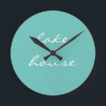 Horloge Ronde Lake House Turquoise Blue Aqua White Elegant Cool<br><div class="desc">Designed with beautiful light teal blue background, this is perfect for venims and home decor for lakeshore homes or new homes. You may change the background color if you wish !</div>