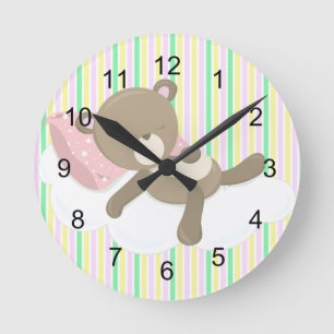 Horloge Ronde Le nounours de repos concernent des rayures