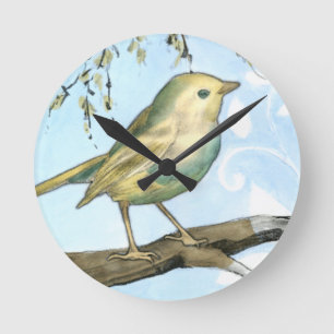 Horloge Ronde Le petit oiseau jaune était perché sur une branche