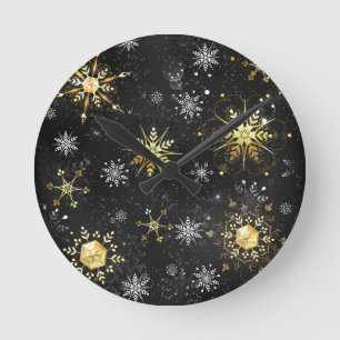 Horloge Ronde Les flocons dorés de Noël sur l'Arrière - plan noi