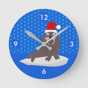 Horloge Ronde Les jolies morses de Noël et les flocons de neige