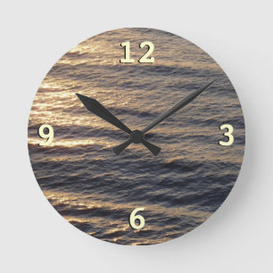Horloge Ronde Lever de soleil sur les eaux océaniques