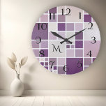 Horloge Ronde Mauve Checkered Pattern Monogram Wall Clock<br><div class="desc">A modern wall clock with a checkered tile pattern with a subtle watercolor effect in mauve,  purple and lilac colors. The numbers are a separate file and can be deleted if you do not need them. Et vous pouvez customize or delete the monogram text.</div>