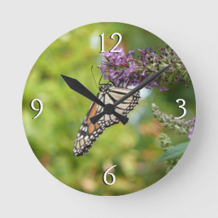 Horloge Ronde Monarque papillon sur Buddleia pourpre