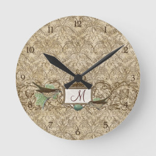 Horloge Ronde Monogramme bleu de rouleau d'oiseaux d'oeufs