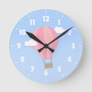 Horloge Ronde Montgolfière rose, aventure parmi les nuages