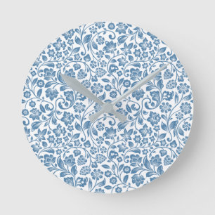 Horloge Ronde Motif de vignes florales bleues et blanches ornées