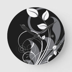 Horloge Ronde Motif floral gris sur le noir