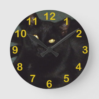 Horloge Ronde Oyeux dorés