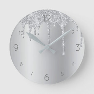 Horloge Ronde Paillettes d'argent qui dégoulinent sur un fond mé