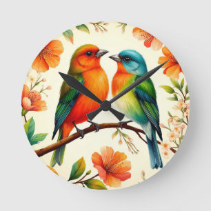 Horloge Ronde Paire d'oiseaux colorés assis parmi des floraisons
