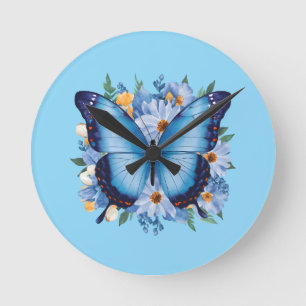 Horloge Ronde Papillon bleu gracieux sur floral