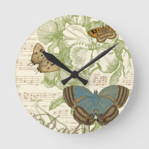 Horloge Ronde Papillons sur la musique de feuille avec la