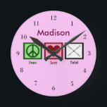 Horloge Ronde Peace Love Baton Twirling Custom Pink<br><div class="desc">Un signe de paix, un coeur, et des bâtons qui tourbillonnent. Peace Love Twirl horloge personnalisée.</div>