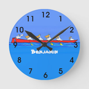 Horloge Ronde Pélicans drôles faisant de l'aviron illustration d