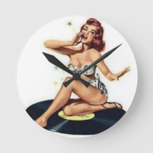 Pin up girl sitting on record