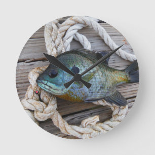 Horloge Ronde Poisson rouge sur quai et corde