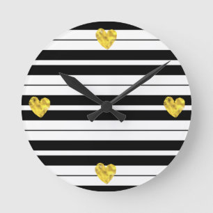 Horloge Ronde Rayures blanches et noires avec des coeurs d'or